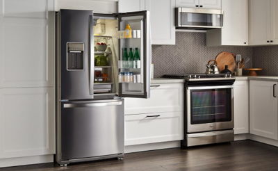 A kitchen with stainless steel appliances.