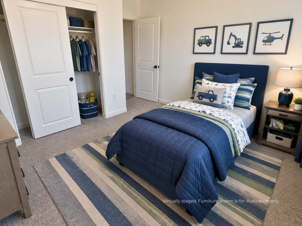 A bedroom with a bed and a blue blanket.
