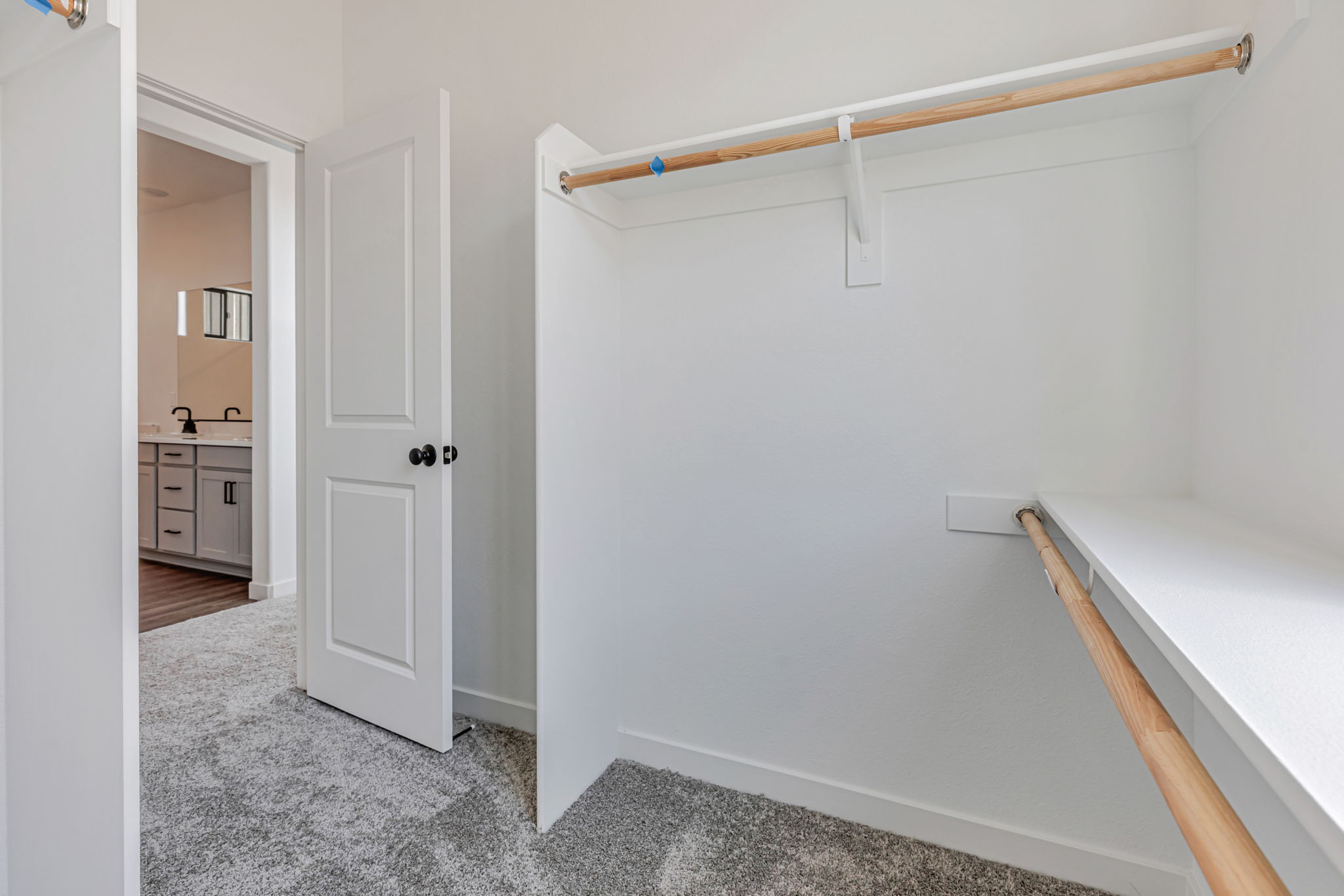 A white wall with a staircase.
